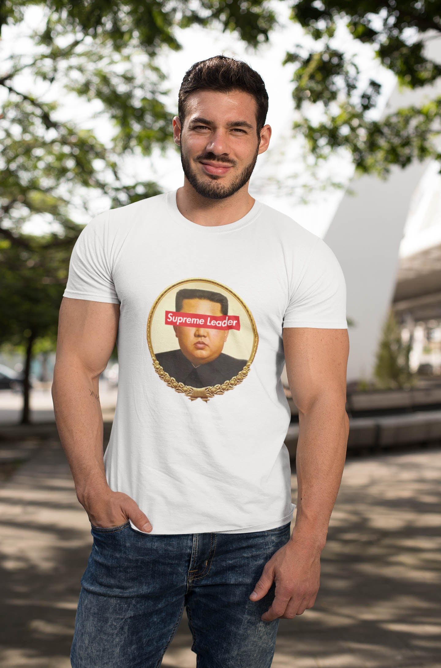 Step into the world of satirical fashion with the Supreme Leader t-shirt—a clever fusion of political commentary and iconic streetwear. Featuring a reimagined portrait of the North Korean dictator with the bold Supreme Leader text blocking his eyes, this design plays on the absurdity of authoritarianism while riffing on the famous supreme streetwear logo.