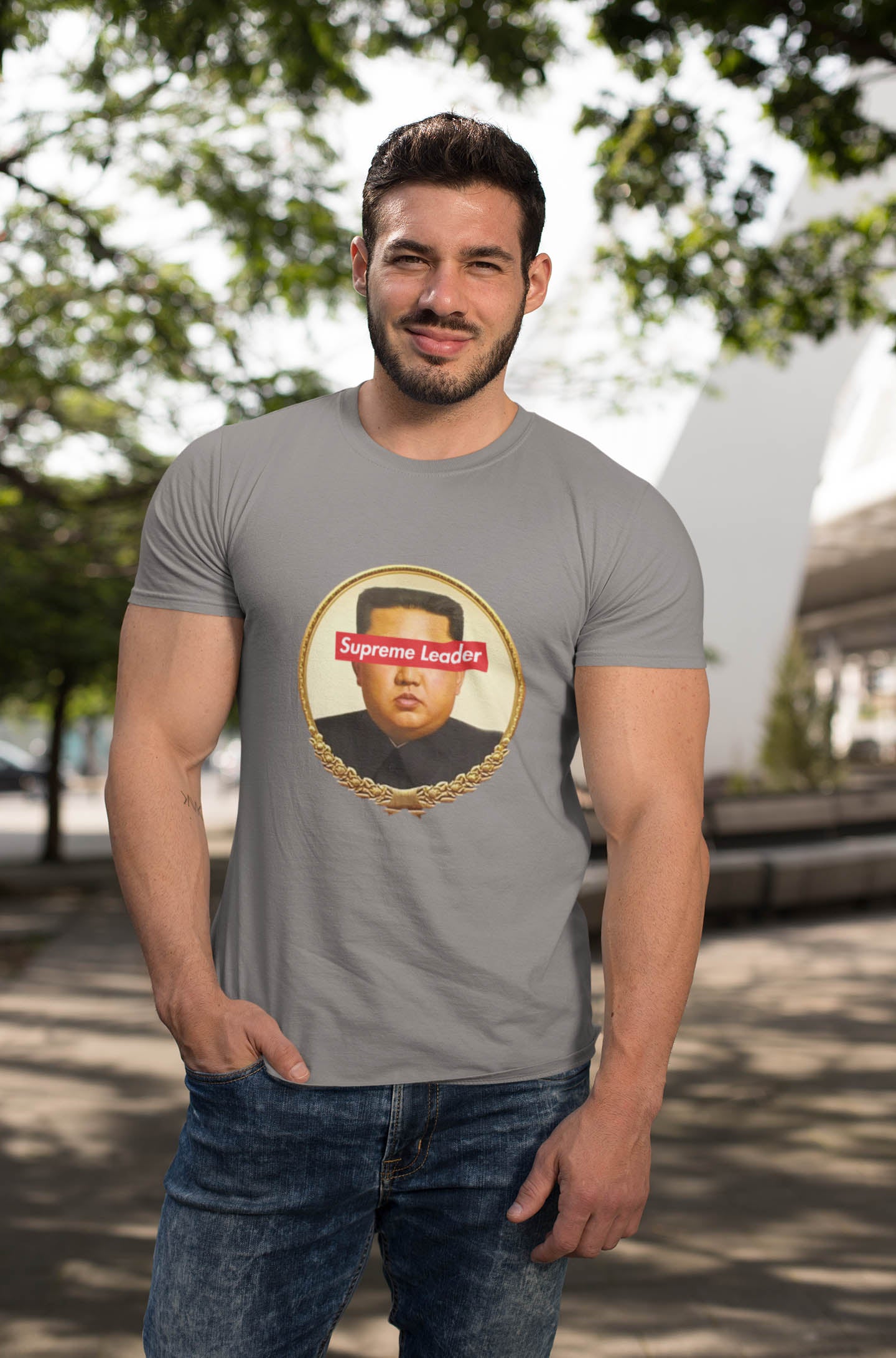 Step into the world of satirical fashion with the Supreme Leader t-shirt—a clever fusion of political commentary and iconic streetwear. Featuring a reimagined portrait of the North Korean dictator with the bold Supreme Leader text blocking his eyes, this design plays on the absurdity of authoritarianism while riffing on the famous supreme streetwear logo.